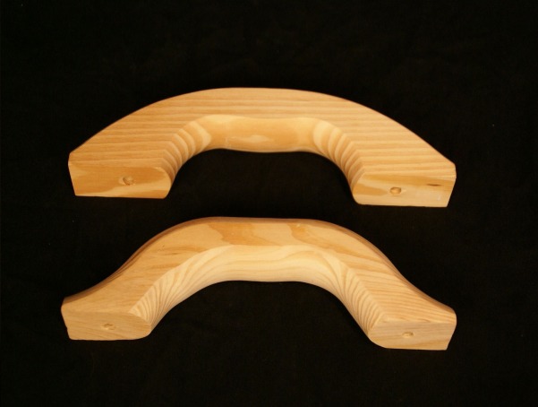 Natural wood float handles for concrete and masonry work, available in bulk with custom branding.